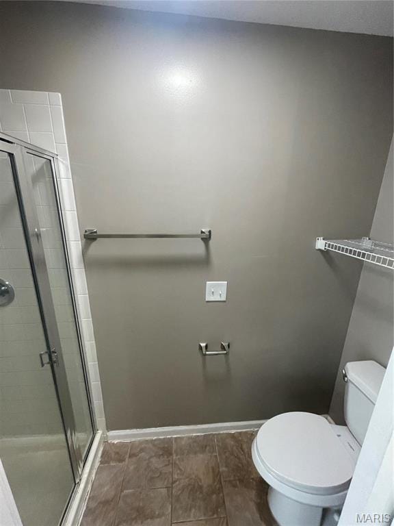 3078 Willow Creek Estates Dr, Florissant, MO 63031 - full bath with baseboards, a shower stall, and toilet