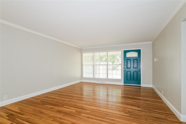 10342 Edgefield Dr, Saint Louis, MO 63136 - entrance foyer with crown molding, light wood-type flooring, and baseboards