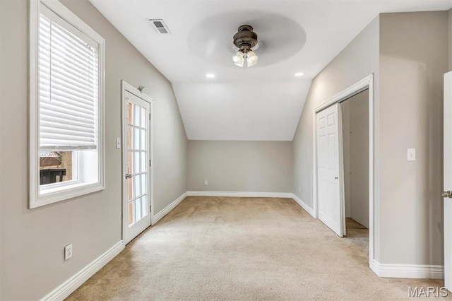 7415 Wellington Ave, Saint Louis, MO 63130 - additional living space with carpet, a ceiling fan, and lofted ceiling