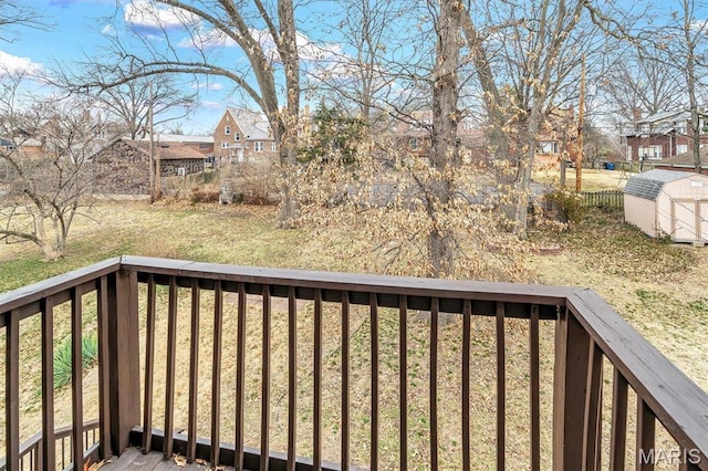 7415 Wellington Ave, Saint Louis, MO 63130 - wooden deck featuring a storage shed and a residential view
