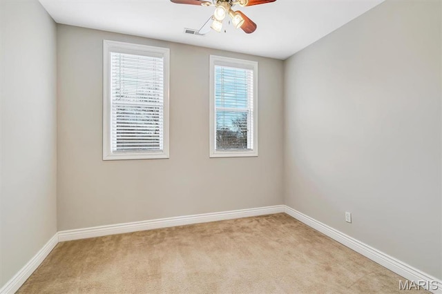 7415 Wellington Ave, Saint Louis, MO 63130 - spare room featuring ceiling fan and carpet