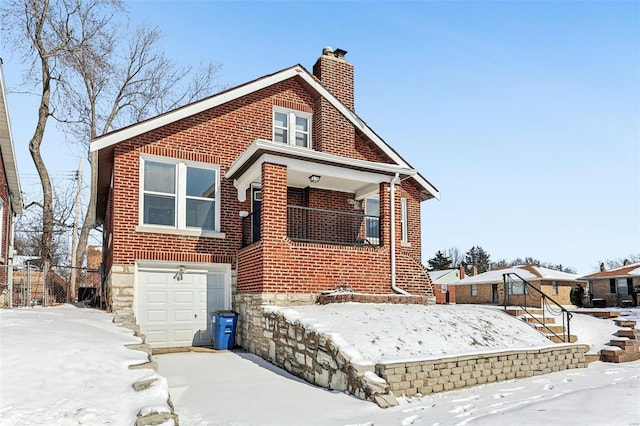 7001 Plymouth Ave, Saint Louis, MO 63130 - view of front of home featuring a chimney, brick siding, and an attached garage