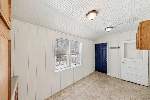7001 Plymouth Ave, Saint Louis, MO 63130 - foyer entrance with wood walls, vaulted ceiling, and wooden ceiling