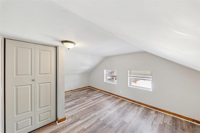 7001 Plymouth Ave, Saint Louis, MO 63130 - bonus room featuring light wood-type flooring, baseboards, and lofted ceiling