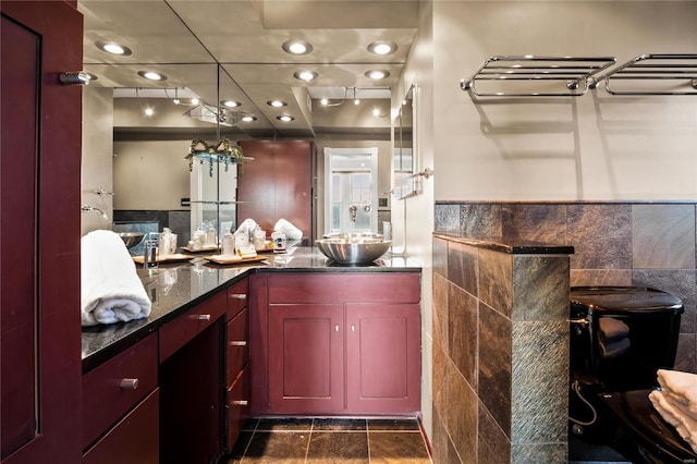 bar featuring tile walls and recessed lighting