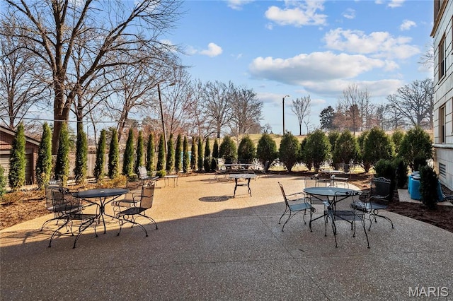 625 S Skinker Blvd Unit 602, Saint Louis, MO 63105 - view of patio featuring outdoor dining space