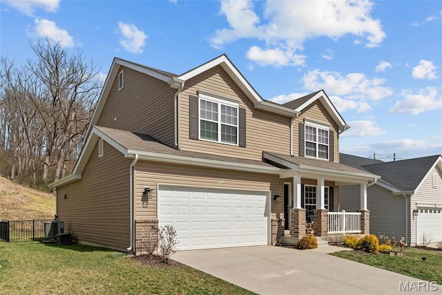 757 Fox Creek Dr, Fenton, MO 63026 - view of front of house featuring covered porch, an attached garage, driveway, and cooling unit