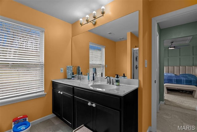 757 Fox Creek Dr, Fenton, MO 63026 - ensuite bathroom featuring ceiling fan and double vanity