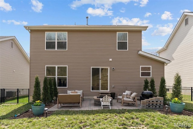 757 Fox Creek Dr, Fenton, MO 63026 - back of property featuring an outdoor living space, a fenced backyard, and a patio area
