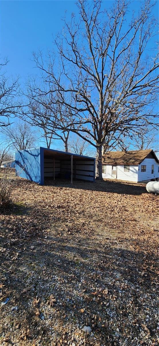 411 11th St, Crocker, MO 65452 - view of yard with an outbuilding