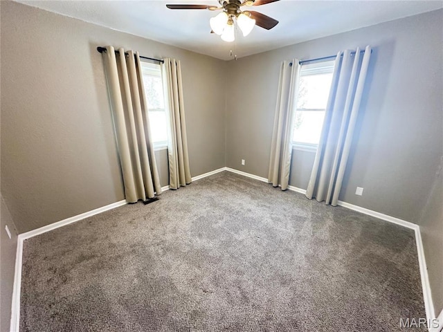 501 N Warfel St, Salem, MO 65560 - spare room with healthy amount of natural light, a ceiling fan, carpet, and baseboards