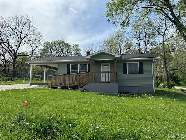 501 N Warfel St, Salem, MO 65560 - view of front of house featuring a chimney, a front yard, and a carport