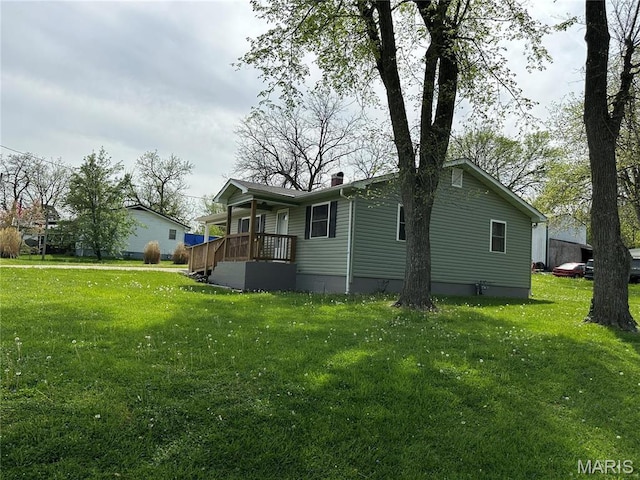 501 N Warfel St, Salem, MO 65560 - rear view of property featuring a lawn and a chimney