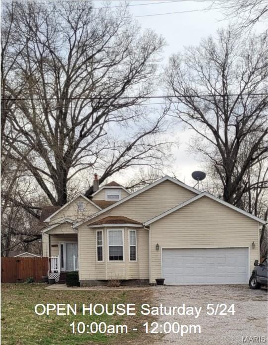 102 W High St, Troy, IL 62294 - view of front of property with a garage and fence