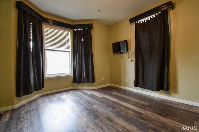 102 W High St, Troy, IL 62294 - empty room featuring wood finished floors and baseboards