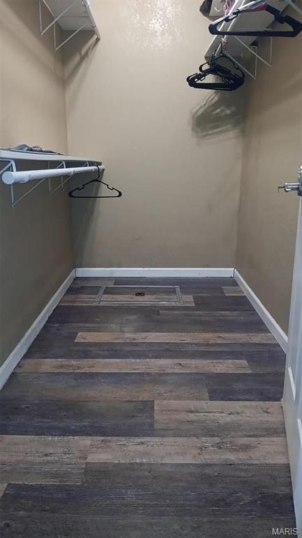 102 W High St, Troy, IL 62294 - walk in closet featuring wood finished floors