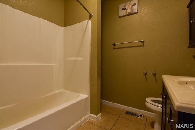 102 W High St, Troy, IL 62294 - bathroom with tile patterned flooring, toilet, vanity, baseboards, and shower / bathtub combination