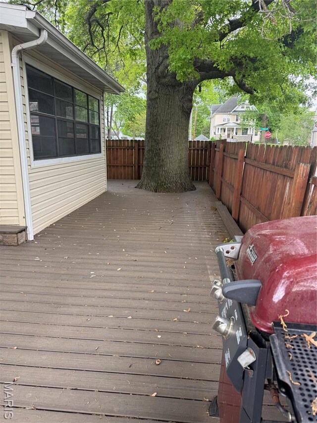 102 W High St, Troy, IL 62294 - wooden deck featuring a fenced backyard and a grill