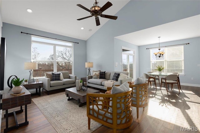 206 Willow Park Ct, Wentzville, MO 63385 - living area with plenty of natural light, dark wood-style floors, high vaulted ceiling, and recessed lighting