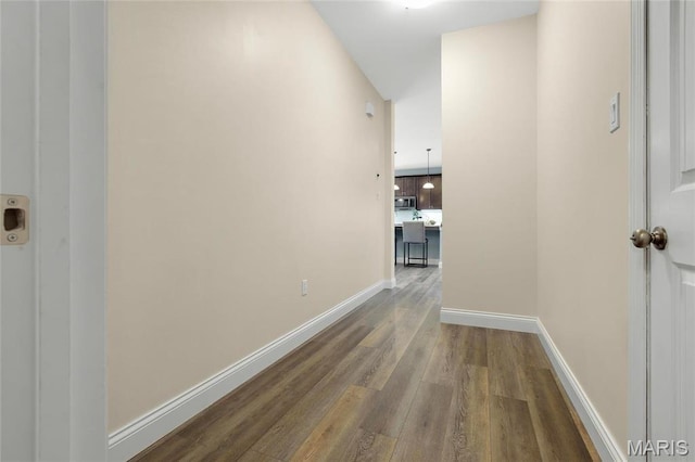 206 Willow Park Ct, Wentzville, MO 63385 - hallway with wood finished floors and baseboards