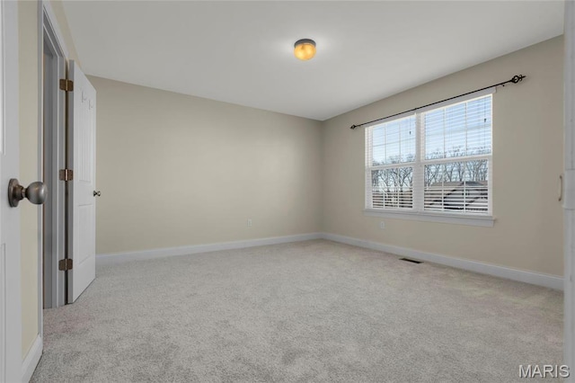 206 Willow Park Ct, Wentzville, MO 63385 - carpeted spare room featuring baseboards