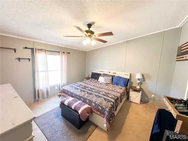 405 County Road 5015, Salem, MO 65560 - bedroom featuring ornamental molding, light carpet, a textured ceiling, and a ceiling fan