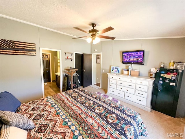 405 County Road 5015, Salem, MO 65560 - bedroom featuring freestanding refrigerator, crown molding, a ceiling fan, and connected bathroom