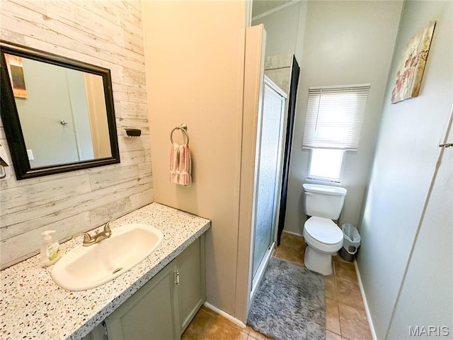 405 County Road 5015, Salem, MO 65560 - bathroom featuring toilet, a stall shower, tile patterned floors, vanity, and wood walls