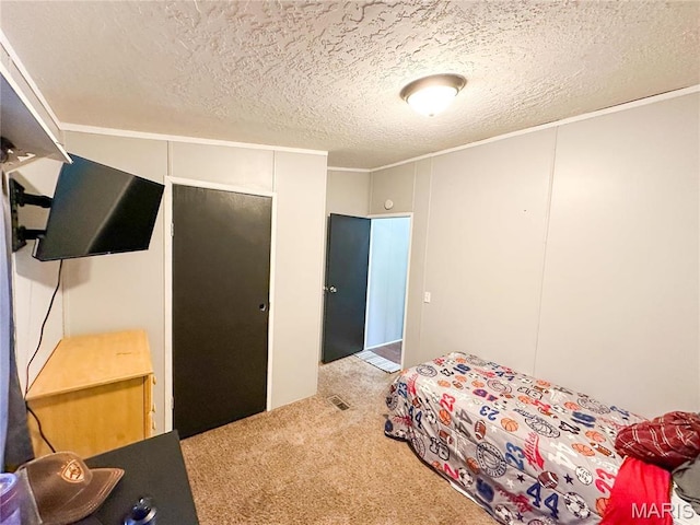 405 County Road 5015, Salem, MO 65560 - carpeted bedroom featuring ornamental molding and a textured ceiling