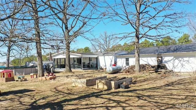 405 County Road 5015, Salem, MO 65560 - back of property featuring a sunroom
