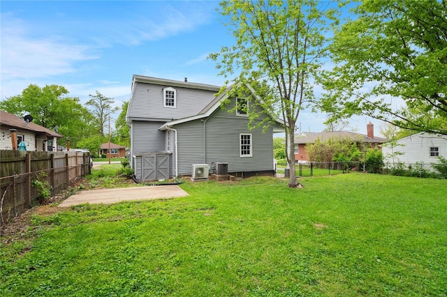 1048 Martha Ln, Saint Louis, MO 63119 - back of house with a patio and central AC