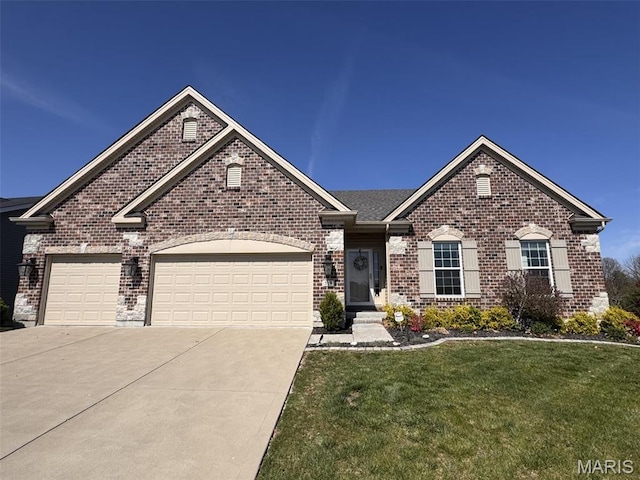 513 Upper Ridgepointe Ct, Lake St Louis, MO 63367 - view of front of home with driveway, brick siding, an attached garage, and a front lawn
