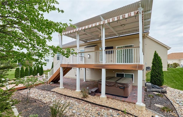 513 Upper Ridgepointe Ct, Lake St Louis, MO 63367 - back of house featuring a hot tub, a patio area, a wooden deck, and stairs