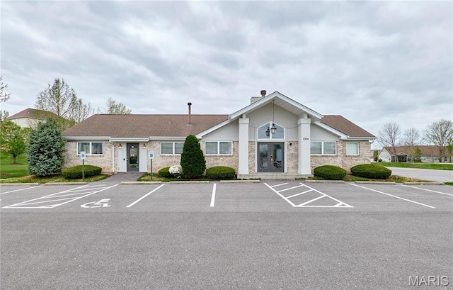 513 Upper Ridgepointe Ct, Lake St Louis, MO 63367 - view of property featuring uncovered parking