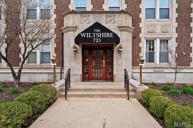 725 S Skinker Blvd Unit 7S, Saint Louis, MO 63105 - doorway to property featuring stone siding and brick siding