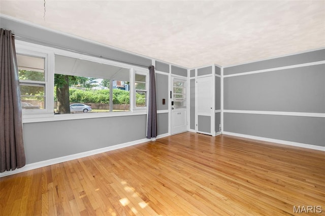6541 SW Ave, Saint Louis, MO 63139 - unfurnished room featuring wood finished floors and baseboards