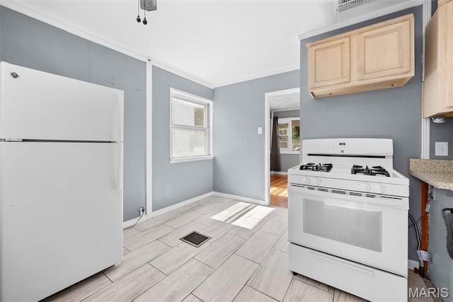 6541 SW Ave, Saint Louis, MO 63139 - kitchen with white appliances, light brown cabinetry, light countertops, wood tiled floors, and ornamental molding