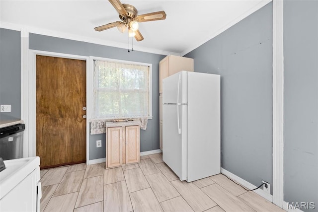 6541 SW Ave, Saint Louis, MO 63139 - kitchen with freestanding refrigerator, a ceiling fan, dishwasher, crown molding, and light countertops
