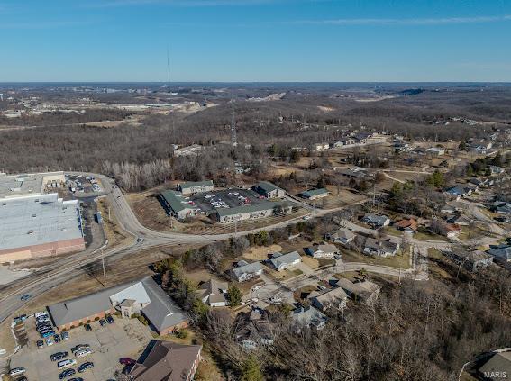 aerial view of property and surrounding area