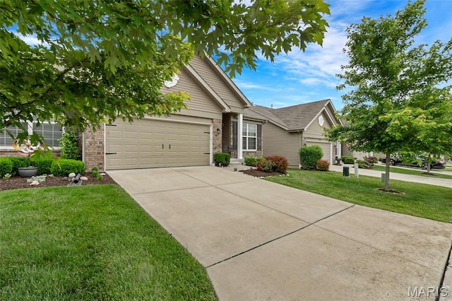 5374 Trailhead Ct, Eureka, MO 63025 - view of front of house with an attached garage, driveway, a front yard, and brick siding