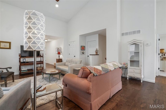 5374 Trailhead Ct, Eureka, MO 63025 - living area with high vaulted ceiling, dark wood finished floors, and baseboards