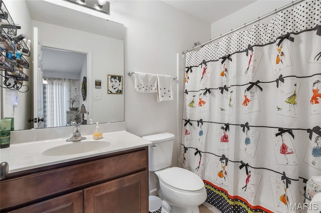 5374 Trailhead Ct, Eureka, MO 63025 - full bathroom with vanity, toilet, and curtained shower