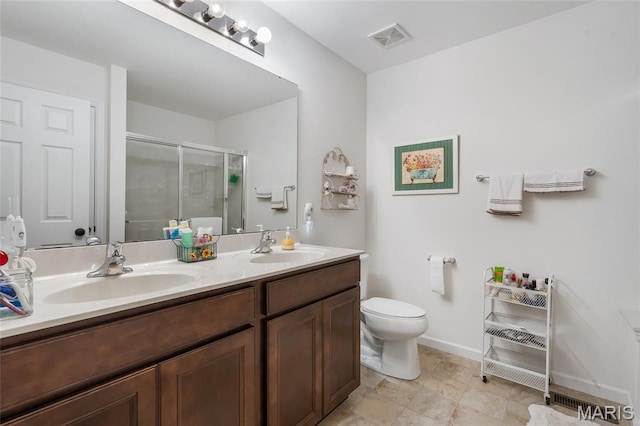 5374 Trailhead Ct, Eureka, MO 63025 - full bath with a shower stall, double vanity, toilet, and baseboards