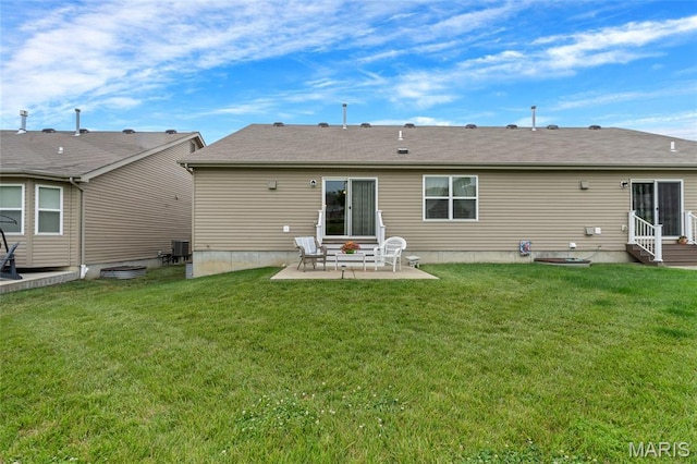 5374 Trailhead Ct, Eureka, MO 63025 - back of property with a patio area, a yard, central AC, and entry steps