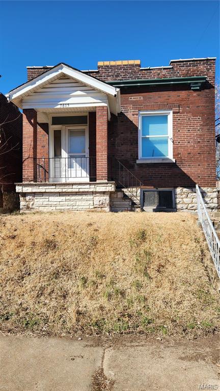3615 Virginia Ave, Saint Louis, MO 63118 - view of front of home with brick siding and a porch