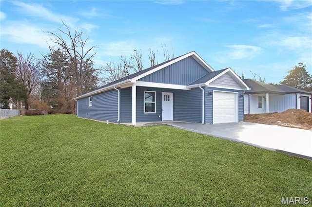 0 Modern St, Sullivan, MO 63080 - view of front of property with an attached garage, concrete driveway, and a front lawn