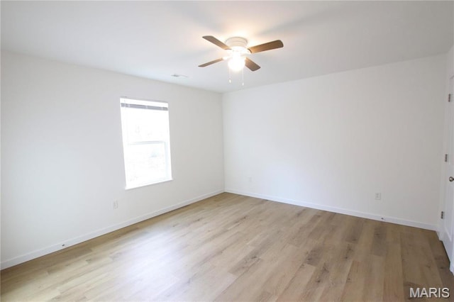 0 Modern St, Sullivan, MO 63080 - spare room with a ceiling fan, light wood-type flooring, and baseboards