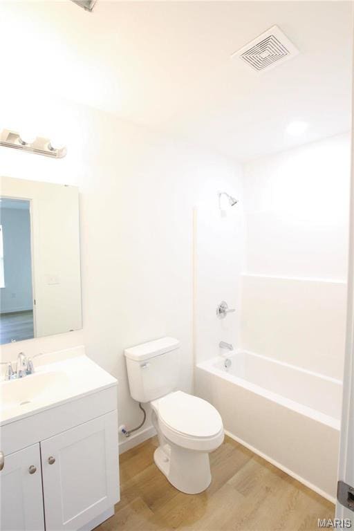 0 Modern St, Sullivan, MO 63080 - full bath with toilet, wood finished floors, vanity, and shower / bath combination