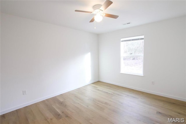 0 Modern St, Sullivan, MO 63080 - spare room with wood finished floors, ceiling fan, and baseboards
