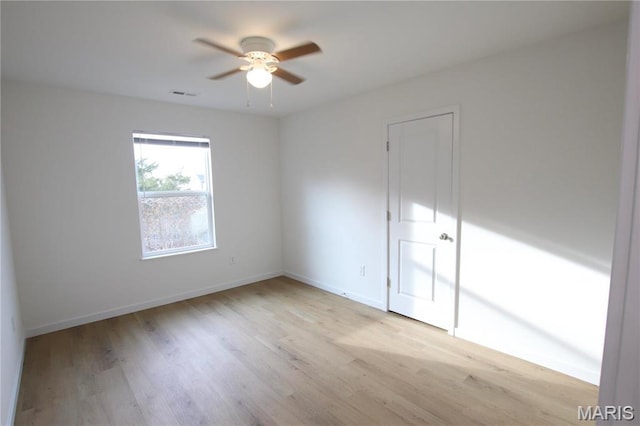 0 Modern St, Sullivan, MO 63080 - spare room with a ceiling fan, light wood-style flooring, and baseboards